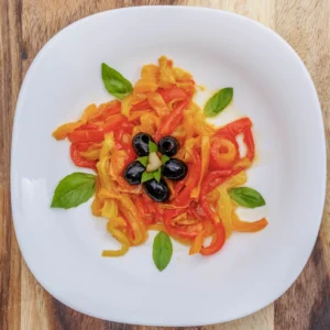 Bell Pepper Puttanesca -Fried peppers in olive oil garlic and black olives. Goes great together with our rosemary focaccia bread as a starter or a side dish. Naturally Vegan