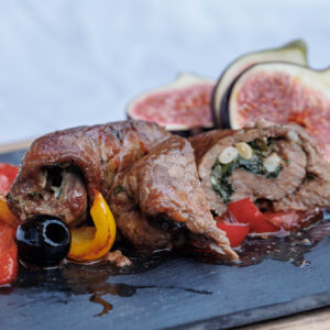 Braised 8oz rump steak, flattened and rolled, slow-cooked and served in a thin, delicate, meaty tomato sauce.