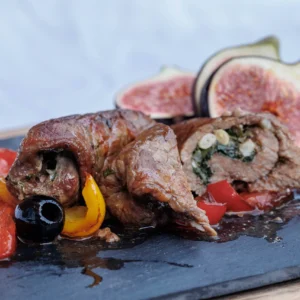 Braised beef Rolls, with a delicate garlic, parsley and pine nuts filling, served in a thin, aromatic meaty tomato sauce.