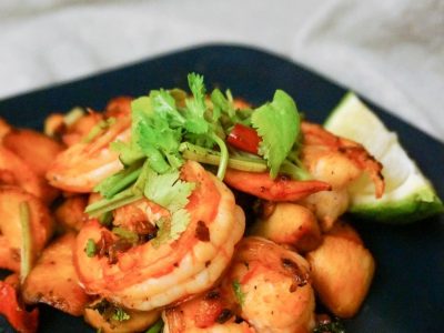 Gamberoni saltati in aglio, prezzemolo e pomodorino